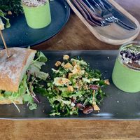 Set menu including a sandwich of mushrooms, pesto, balsamic, and microgreens. Side salad and mini acai cup.   at Cafe Jeju 901 in Jeju