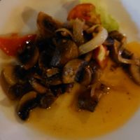 Mushrooms with garlic, onion, olive oil and tomato. Very flavourful! at Laterna Taverna in Paphos