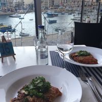 Lasagna overlooking the bay at Two Buoys Bistro in St Julians