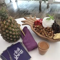 Delicious! Peanut butter in small glass for self pouring.  at Acai Queen - Gootama in Ubud