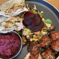 Falafel, beetroot and walnut dip, & salad with flatbread    at Home in Manchester