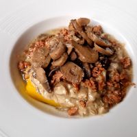 Polenta with fresh mushrooms and "sausage" beyond meat. at OH Ficomaeco in Brescia