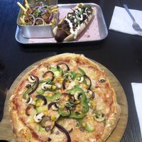 Notorious V.E.G pizza and a hot dog :) at Happy Friday Kitchen  in Oxford