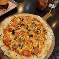 'wurst' pizza and burger with aubergine bacon at Happy Friday Kitchen  in Oxford