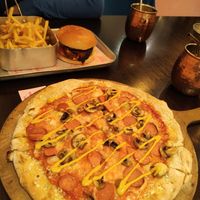 'wurst' pizza and burger with aubergine bacon + cocktail at Happy Friday Kitchen  in Oxford