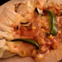 Notorious V.E.G stuffed crust pizza at Happy Friday Kitchen  in Oxford