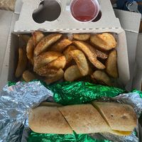 Garlic bread (dairy free) and Cajun spiced wedges at Hell Pizza in Whangarei