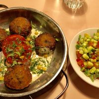 Vegan patties and Israeli salad at Java in Tel Aviv