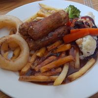 Trio of sausages with potatoes and vegetables at Green Dragon in Wymondham