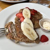 French toast and pizza in background   at Sage Regenerative Kitchen in Pasadena