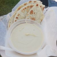 Hummus with pita bread at Tabouli in Warren
