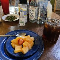 “Desayuno del día” it’s all day, It comes with your plate of choice plus fruit of the day & cafe de olla, I got it with Ice  at Trece Lunas in Monterrey