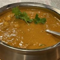 Kadala Curry (vg) – chickpeas cooked in a tangy tamarind, and spice masala.   at Dosa Kitchen in Newcastle Upon Tyne