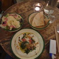 Side salad and vegan syrian cheese with pita bread at Aujourd'hui Demain Cafe in Paris
