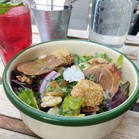 'Honey Goat Salad' + quinoa, no-Prosciutto, red onion, walnuts, mustard sauce, no-Parmesan, roast apple, thyme & oregano flakes (15€) &
 'Bissap' hibiscus drink (3€) at Aujourd'hui Demain Cafe in Paris