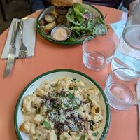 Mac and cheese at the front. at Aujourd'hui Demain Cafe in Paris
