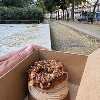 A Paris-Brest dessert that I took out and devoured nearby  at Aujourd'hui Demain Cafe in Paris