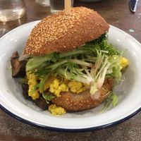 Breakfast burger avec verdure, tofu brouille, champignons et oignons cuits  at Aujourd'hui Demain Cafe in Paris