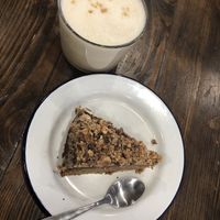 Cake and peanutmacciato at Aujourd'hui Demain Cafe in Paris