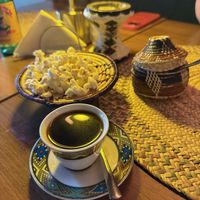 Coffee, served with popcorn   at Gezana Eritrean Restaurant in Eindhoven