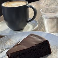 soy milk coffee and vegan chocolate cake #Veganuary at Loveat - Dizengoff in Tel Aviv