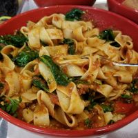 fresh paperdelle with sauteed spinach, garlic, red sauce, and lots of red pepper! amazing!! at Marino's Kitchen in Marlton