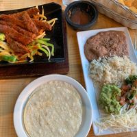 Beyond fajitas! Served in a cast iron shovel! at Mesa Fresca in Oregon City