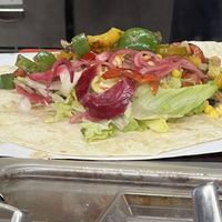 Burrito prep; I love the spicy peppers!   at Burrito Loco - Spalena in Prague