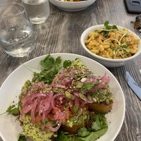 Avo toast, side of mac and the proper breakfast in the back! at Fox & Fig in Savannah