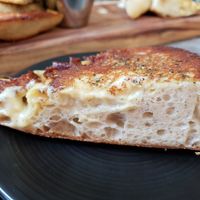 Cashew Cheese Garlic Bread slice at Fox & Fig in Savannah