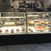Bakery case - all vegan truffles, cheesecake, brownies, donuts, and more!  at Fox & Fig in Savannah
