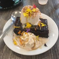 Warm brownie with ice cream on top.  at Fox & Fig in Savannah