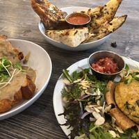 (Left) Croissant & Gravy. (Far Middle) Garlic Bread. (Right) Quiche.  at Fox & Fig in Savannah