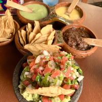 Chips and guacamole and vegan tacos with mushrooms and peppers . at Tacos Revolucion in Puerto Vallarta