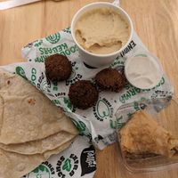 Baklava, falafels and hummus, bread at What The Pitta in North West London