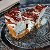 Banana/caramel and whipped cream cake at Wild Food in Granada