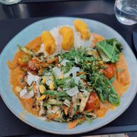 Red curry with vegan fried shrimps at Wild Food in Granada