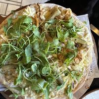 Incredible mushroom truffle béchamel pizza  at Wild Food in Granada