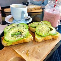 tostas de aguacate con smoothy  at Wild Food in Granada