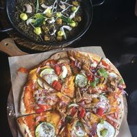 quinoa paella and the mediterranean pizza at Wild Food in Granada