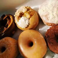 Cinnamon sugar, vanilla glazed, chocolate cake, peanut butter chocolate, apple pie, pumpkin creme at Revolution Doughnuts in Atlanta