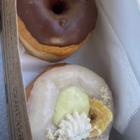 Chocolate glazed and banana creme pie  at Revolution Doughnuts in Atlanta