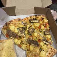 Fire breathing dragon pizza at Pizza Luce in Duluth