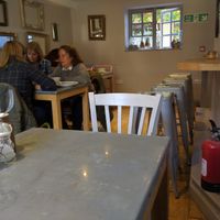 Upstairs seating at Kalm Kitchen Cafe in Guildford