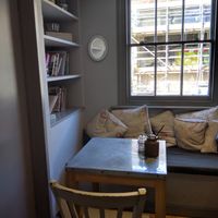 Upstairs seating at Kalm Kitchen Cafe in Guildford