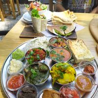 Can't remember the exact name, something like "tasty plate for two" (vegan) at W Der Imbiss - Nollendorfplatz in Berlin