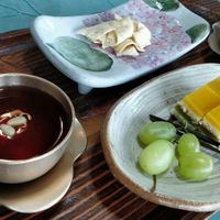 Desert - sweet drink (cinnamon, green plum or pumpkin sweet rice), dried tofu snack, fruit and cake at Ssukbujaeng-i 쑥부쟁이 in Gyeongju