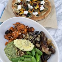 Ancient grains bowl & butternut squash pizza at True Food Kitchen - La Jolla Village in San Diego