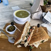 Portobello mushroom, hummus, and grilled tofu panini with Broccoli soup. at Barra Light in Puerto Vallarta