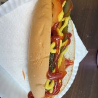 Vegan hot dog with pickles, mustard and ketchup   at Govinda's at the Beach in Ao Nang